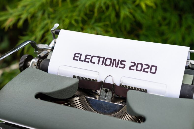Typewriter with white page saying Elections 2020